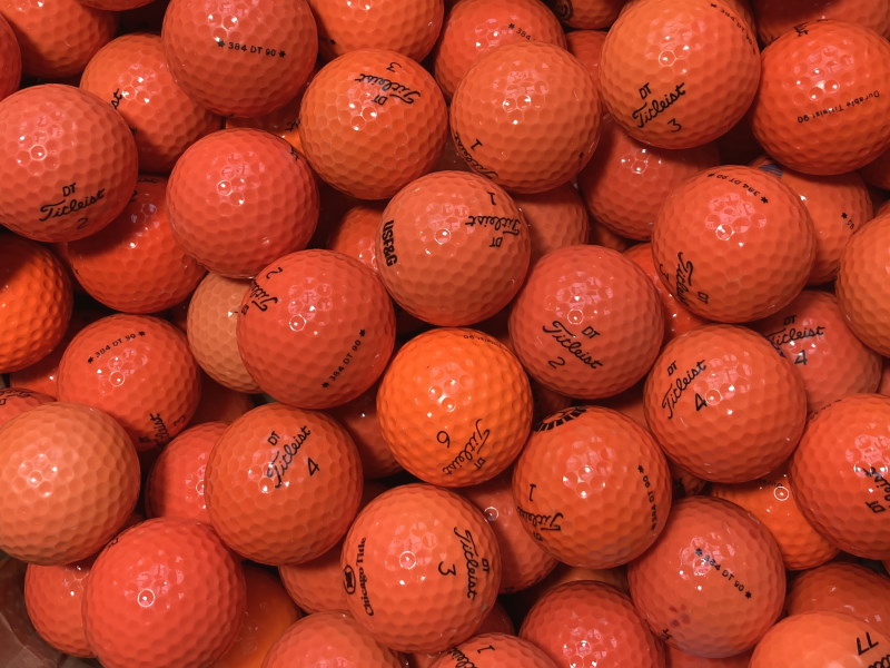 Titleist Mix Orange Lakeballs - gebrauchte Titleist Mix Orange Golfbälle AAA/AAAA-Qualität